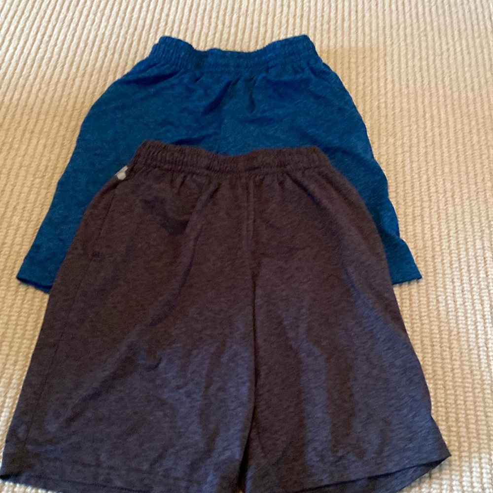 Tek Gear youth shorts. Both size youth Medium. Both blue